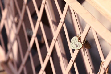 heart lock in a fence
