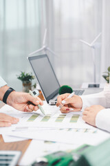 Plakat Business people working on sustainable innovation project. renewable energy concept. Teamwork Meeting, partner on model building company office technology, based green businesses and global warming.