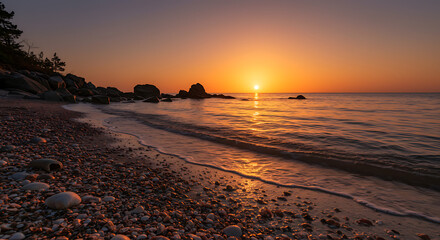 Stunning Seascape Sunrise over Rocky Coastline with Seashells