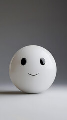 A spherical sculpture with a cheerful smiling expression, set against a neutral background.