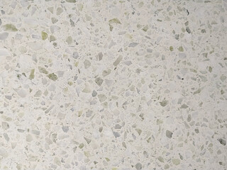 Mosaico de terrazo claro blanco gris y verde. Se puede usar como fondo.