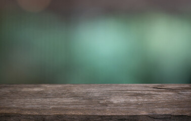 Empty wood table top and blur of restaurant background selective focus product display