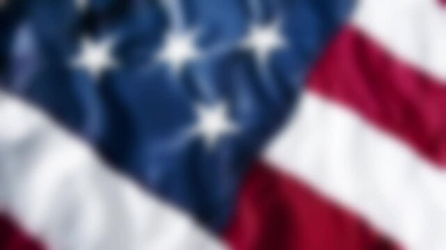 Defocused waving flag of USA, seamless close-up american flag loop animation. 