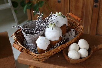Easter cakes, painted eggs and a bouquet of pussy willow