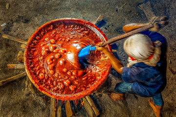 The making of Dodol a traditional snack from the original tribe of Jakarta. It is made from sticky...