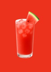 Watermelon Juice in Glass with Ice and Slice on Red Background