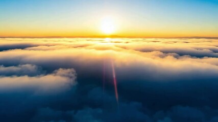 Airplane window view A serene sunrise breaks through soft clouds, illuminating the sky with vibrant colors of dawn, creating a peaceful scene.