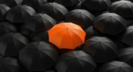 Obraz premium Vibrant Orange Umbrella Amidst Collection of Black Umbrellas Showcasing Individuality Concept