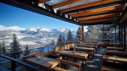 Fototapeta premium Mountain view restaurant with wooden tables and benches on a snow-covered terrace
