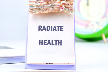 Medicine and Bladder Cancer concept. Copy space. RADIATE HEALTH written on the desktop calendar to...
