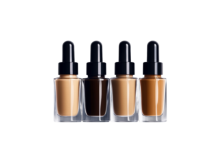 Assortment of liquid foundation in glass bottles with dropper applicators