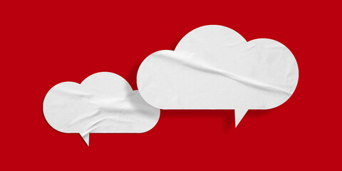 White speech bubble crumpled paper isolated on red background