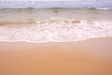 Nature of the beach and sea Summer with sunshine, sandy beaches, clear blue waters sparkling against the blue sky. On an island with good ecology and environment Background for summer vacation