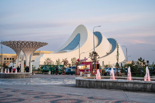 TURKESTAN, Kazakhstan - April 06, 2023: Keruen Sarai shopping and entertainment tourist complex in the evening