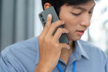 Remote Work and Digital Transformation. Professional on phone call discussing projects.