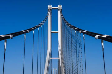 Fototapeta premium pylon and cables of the suspension bridge