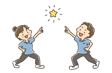 腰に手を当てて星を指差しているスクラブ姿の女性と男性