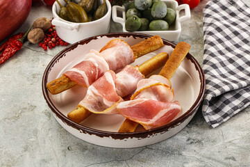 Antipasti - Grissini with pork bacon