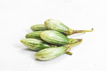 Small organic young green eggplant