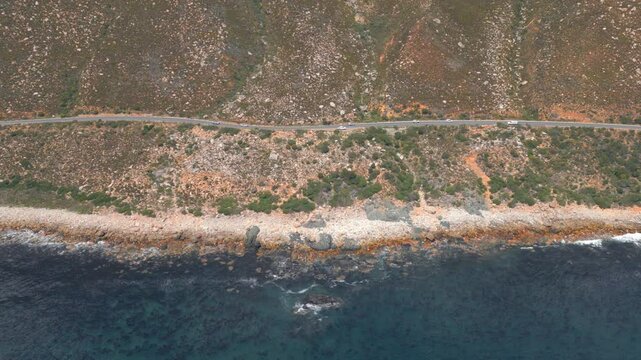Clarens Drive, beautiful coastal road in Western Cape of South Africa -drone flying along the road