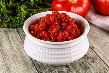 Diced ripe tomato with sauce