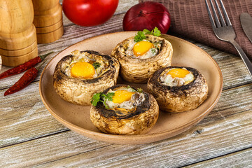 Baked champignon with quail egg