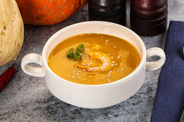 Pumpkin cream soup with prawns