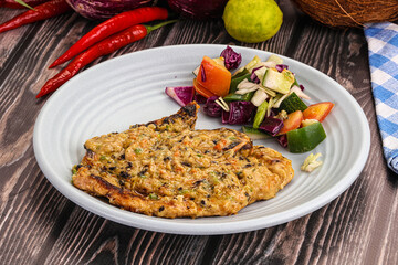 Tasty chicken steak with vegetables