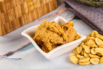 Crunchy peanut butter fat product