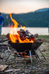 Camping outdoors Bonfire in incinerator