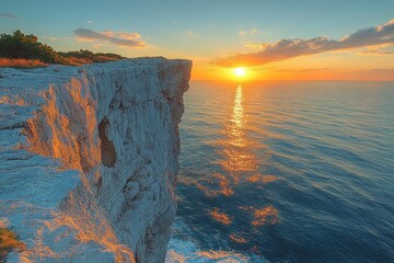 Sunset over coastal cliff, ocean view