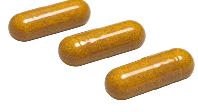 Three translucent amber capsules filled with a fine, orange-yellow powder, arranged diagonally against a black background