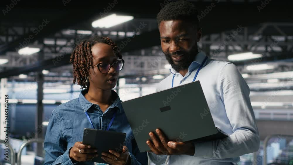 Poster data center system administrators using laptop to review ai llm visualizations. african american it 