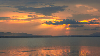 Scenic Sunset Over the Calm Lake