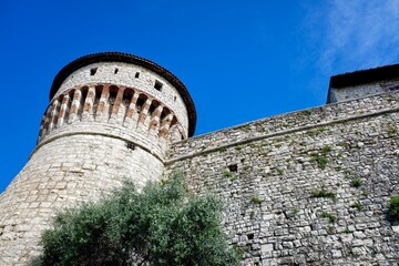Brescia Castle (known as Falcone d'Italia) is a fortress built during the medieval period on the Cidneo hill in Brescia, Italy above the historic center of the city