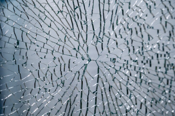 transparent glass, broken into a large number of fragments and parts