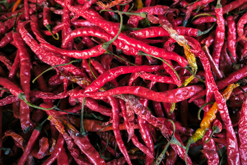 Close up dried chilli background. Red hot chili wallpaper. chilli from traditional market.