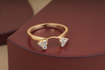 golden finger ring for women isolated image