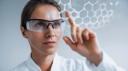 A medical researcher in safety glasses interacts with a glowing hexagonal molecular structure on a futuristic display, representing advancements in science, medicine, and innovation.