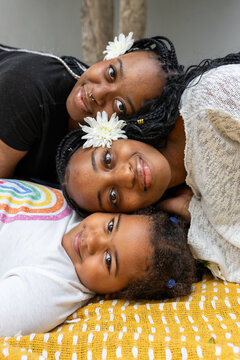 Young adults babysitting a young child