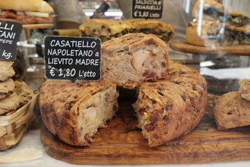 Casatiello napoletano exposed in the window - Traditional Easter specialty of Campania cuisine