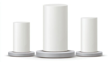 Three white cylindrical pedestals of varying heights, on gray bases, create a podium for awards or displays