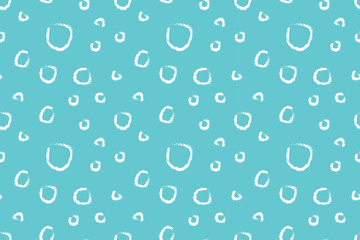 Light seamless polka dot pattern on  blue background. Abstract spots made with  brush. For backgrounds, wallpapers, textiles, packaging, and  website.