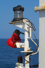 stern lights of a merchant ship