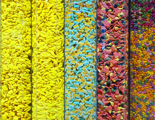 A vibrant mix of rainbow-colored candies.