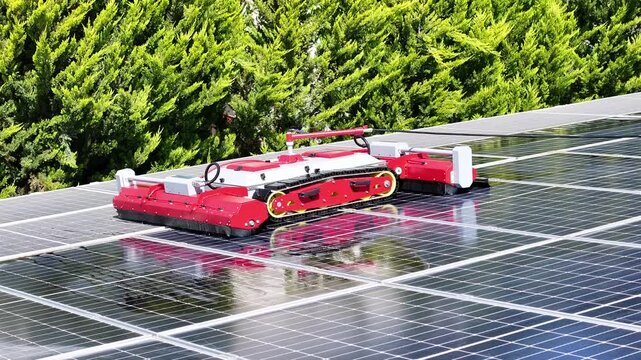 Robot cleans solar panels - 4k drone footage of robot cleaning solar panels
