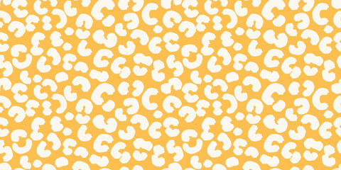 Plain seamless leopard print pattern with white spots, organic shapes on a  yellow background. Bold, modern, and trendy design for textiles, fashion, digital wallpapers, creative branding projects.