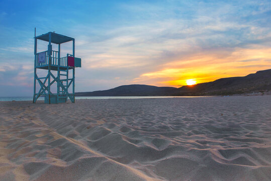 lifeguard station tower at sunset on the beach Simos on the island of Elafonisos in peloponnese , Greece