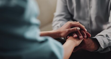 Therapist, holding hands and senior patient for counselling, comfort and support with grief at clinic. People, psychology and consultation for mental health, anxiety and kindness with care at office