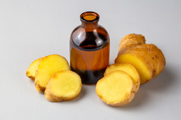 Ginger essential oil in a small bottle. Selective focus. nature.